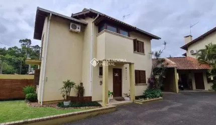 Casa em condomínio fechado com 3 quartos à venda na Rua Antônio José Cavasotto, 95, Ideal, Novo Hamburgo, 140 m2 por R$ 650.000