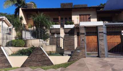 Casa com 3 quartos à venda na Rua Gustavo Leopoldo Feltes, 825, Canudos, Novo Hamburgo, 283 m2 por R$ 989.000