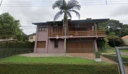 Casa com 4 quartos à venda na Rua Tubarão, 433, Primavera, Novo Hamburgo, 267 m2 por R$ 790.000