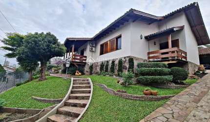 Casa com 4 quartos à venda na Rua Frederico Groehs Neto, 180, Vila Nova, Novo Hamburgo, 427 m2 por R$ 1.250.000