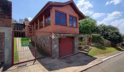 Casa com 3 quartos à venda na Rua Epitácio Pessoa, 745, Primavera, Novo Hamburgo, 326 m2 por R$ 1.290.000