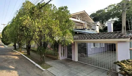Casa com 4 quartos à venda na Rua Gustavo Leopoldo Feltes, 275, Canudos, Novo Hamburgo, 276 m2 por R$ 450.000