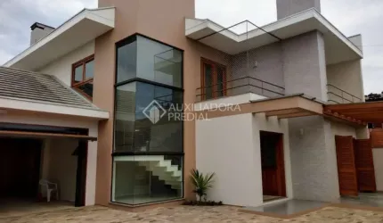Casa em condomínio fechado com 3 quartos à venda na ALBANO HANSEN, 1542, Travessão, Dois Irmãos, 238 m2 por R$ 1.140.000