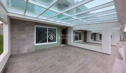 Casa em condomínio fechado com 3 quartos à venda na Rua Luiz de Camões, 195, União, Estância Velha, 162 m2 por R$ 699.000