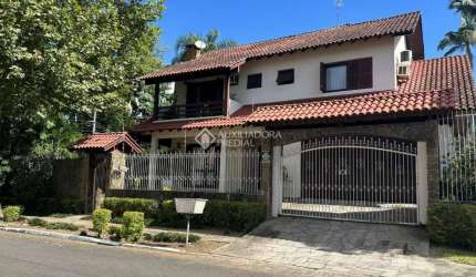 Casa em condomínio fechado com 4 quartos à venda na Rua Encruzilhada do Sul, 505, Mauá, Novo Hamburgo, 238 m2 por R$ 980.000