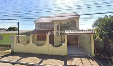 Casa em condomínio fechado com 3 quartos à venda na Rua Buttenbender, 905, Fátima, Canoas, 244 m2 por R$ 779.900