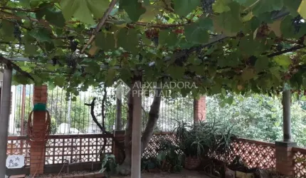 Casa em condomínio fechado com 2 quartos à venda na Rua Eloema de Oliveira Barcelos, 370, Morro Santana, Porto Alegre, 80 m2 por R$ 320.000