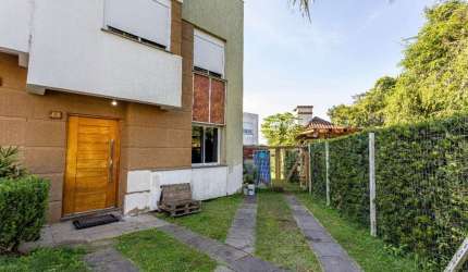 Casa em condomínio fechado com 3 quartos para alugar na Rua Alberto Jerônimo Guerra, 20, Mário Quintana, Porto Alegre, 147 m2 por R$ 3.400