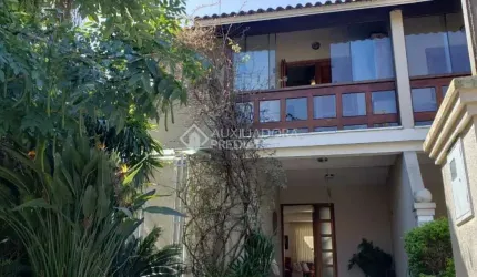 Casa em condomínio fechado com 3 quartos à venda na Avenida Eduardo Prado, 2050, Cavalhada, Porto Alegre, 300 m2 por R$ 960.000