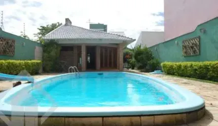 Casa em condomínio fechado com 4 quartos à venda na Rua Dulcimar Cardoso, 340, Paraíso, Sapucaia do Sul, 340 m2 por R$ 1.060.000