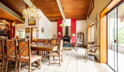 Casa em condomínio fechado com 5 quartos à venda na Avenida da Cavalhada, 5205, Cavalhada, Porto Alegre, 565 m2 por R$ 3.800.000