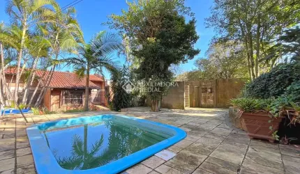Casa com 3 quartos à venda na Rua Edgar Luiz Schneider, 490, Jardim Isabel, Porto Alegre, 350 m2 por R$ 1.290.000