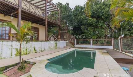 Casa com 4 quartos à venda na Rua Chiriguano, 265, Vila Assunção, Porto Alegre, 393 m2 por R$ 1.490.000
