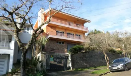 Casa com 4 quartos à venda na Rua Caeté, 1047, Vila Assunção, Porto Alegre, 323 m2 por R$ 1.800.000