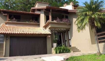 Casa em condomínio fechado com 3 quartos à venda na Rua Edgar Luiz Schneider, 510, Jardim Isabel, Porto Alegre, 310 m2 por R$ 1.330.000