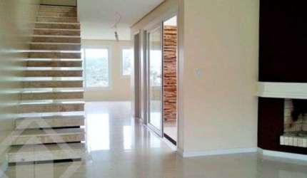 Casa em condomínio fechado com 3 quartos à venda na Rua Professor Antônio José Remião, 328, Espírito Santo, Porto Alegre, 217 m2 por R$ 710.000