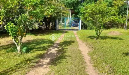 Terreno em condomínio fechado à venda na Rua Dona Mariana, 812, Restinga, Porto Alegre, 122 m2 por R$ 450.000