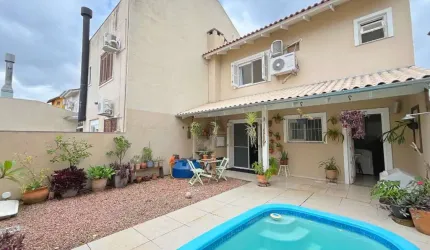 Casa em condomínio fechado com 2 quartos à venda na Rua Guatambu, 280, Hípica, Porto Alegre, 122 m2 por R$ 649.000