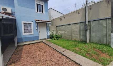 Casa em condomínio fechado com 2 quartos à venda na Rua Alcebíades Ribeiro, 48, Aberta dos Morros, Porto Alegre, 103 m2 por R$ 220.000