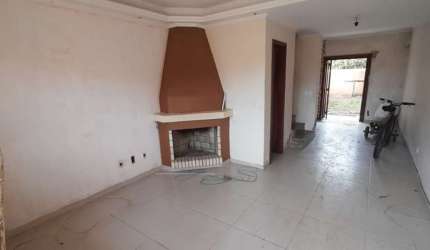 Casa com 3 quartos à venda na Rua Waldemar da Silva Tavares, 210, Guarujá, Porto Alegre, 108 m2 por R$ 450.000