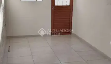 Casa em condomínio fechado com 1 quarto à venda na Rua Padre João Batista Reus, 3036, Camaquã, Porto Alegre, 46 m2 por R$ 140.000