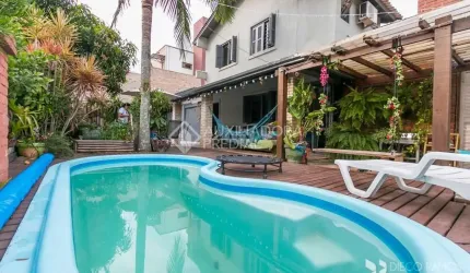 Casa em condomínio fechado com 3 quartos à venda na Estrada João Passuelo, 1060, Vila Nova, Porto Alegre, 230 m2 por R$ 520.000