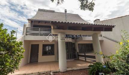 Casa em condomínio fechado com 4 quartos à venda na Rua Doutor Castro de Menezes, 943, Vila Assunção, Porto Alegre, 299 m2 por R$ 1.290.000