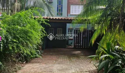 Casa em condomínio fechado com 3 quartos à venda na Rua dos Guaranis, 154, Espírito Santo, Porto Alegre, 220 m2 por R$ 690.000