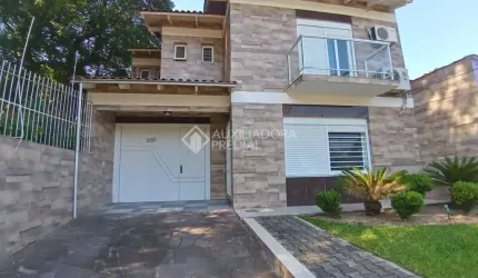 Casa com 3 quartos à venda na Rua Sepé Tiaraju, 1352, Nonoai, Porto Alegre, 171 m2 por R$ 904.000