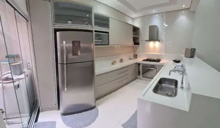 Casa com 2 dormitórios à venda, 125 m² por R$ 724.000 - Parque Universitário - Americana/SP