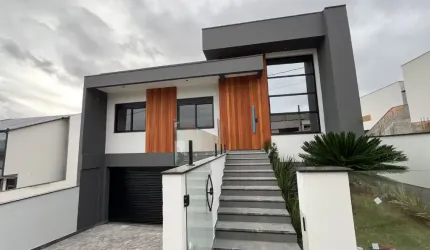 Casa com 3 dormitórios à venda, 197 m² por R$ 1.250.000,00 - Potecas - São José/SC