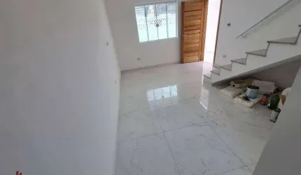 Sobrado com 3 dormitórios à venda, 104 m² por R$ 595.000,00 - tude basto - Praia Grande/SP