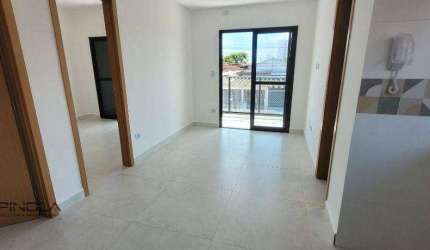 Sobrado com 3 dormitórios à venda, 67 m² por R$ 430.000,00 - Maracanã - Praia Grande/SP