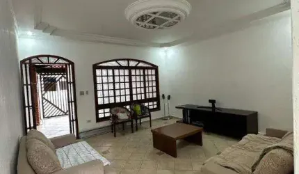 Sobrado com 3 dormitórios à venda, 147 m² por R$ 650.000 - Tupi - Praia Grande/SP