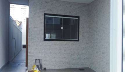 Sobrado com 3 dormitórios à venda, 125 m² por R$ 720.000,00 - Cidade Ocian - Praia Grande/SP