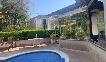 Casa com 4 dormitórios à venda, 553 m² por R$ 2.980.000,00 - Condomínio Reserva Colonial - Valinhos/SP
