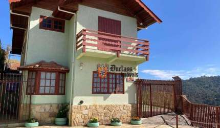 Sobrado com 4 dormitórios à venda, 259 m² por R$ 1.200.000,00 - Jardim Guararema - Campos do Jordão/SP