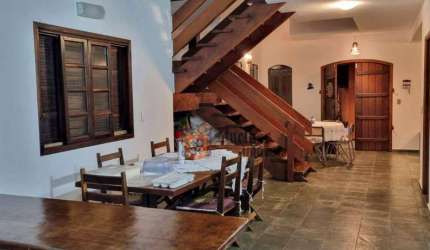 Sobrado com 4 suítes à venda, 215 m² por R$ 950.000 - Massaguaçu - Caraguatatuba/SP