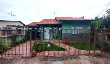 Excelente casa térrea com piscina e depósito nos fundos, no bairro Igara -Canoas.