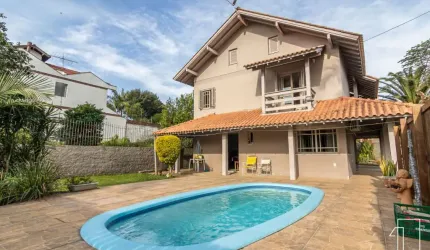 Casa com 3 quartos à venda na Rua Índia, 21, Petrópolis, Novo Hamburgo por R$ 790.000