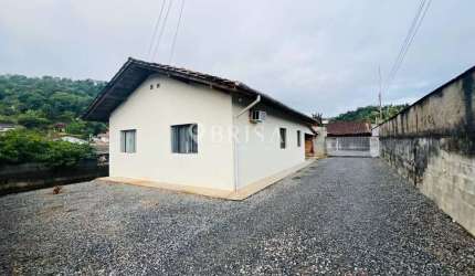 TERRENO COM 2 CASAS NO BAIRRO JARAGUÁ 99