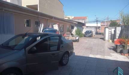Casa a venda c/ loja no mesmo terreno a venda no Uberaba em Curitiba Pr