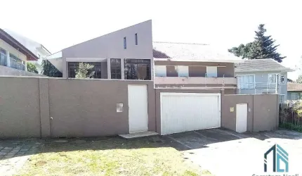 Casa, 04 quartos c/suíte, 02 subsolos tipo bunker, com 05 ambientes subterrâneos amplos, ideal para adega e estúdio, em Curitiba PR