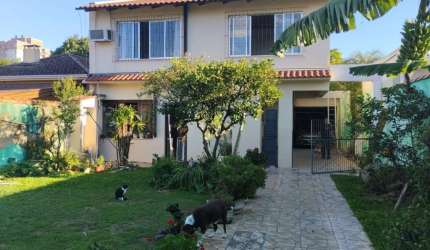 Casa em condomínio fechado com 3 quartos à venda na Rua Coronel Ricardo Machado, 80, Marechal Rondon, Canoas, 240 m2 por R$ 957.450