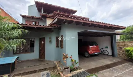 Casa em condomínio fechado com 4 quartos à venda na Rua Nazaré, 48, Nossa Senhora das Graças, Canoas, 232 m2 por R$ 1.200.000