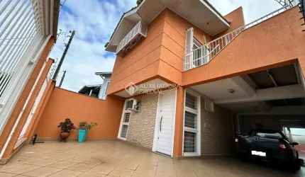 Casa com 4 quartos à venda na Rua Martinho Lutero, 125, Harmonia, Canoas, 178 m2 por R$ 850.000