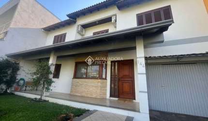 Casa com 5 quartos à venda na Rua das Petúnias, 144, Estância Velha, Canoas, 214 m2 por R$ 1.080.000