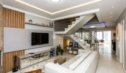 Casa em condomínio fechado com 4 quartos à venda na Rua Bélgica, 76, Marechal Rondon, Canoas, 221 m2 por R$ 1.999.000