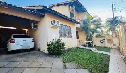 Casa com 4 quartos à venda na Rua da Felicidade, 123, Estância Velha, Canoas, 113 m2 por R$ 599.900