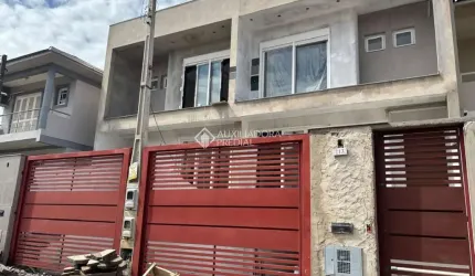 Casa com 3 quartos à venda na Rua Dinamarca, 223, Estância Velha, Canoas, 200 m2 por R$ 1.450.000
